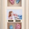29- blue & pink casts in ream wood frame