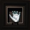 27- blue hand cast in black wood frame with black backing