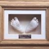 38- x2 feet casts white in oak frame with white backing